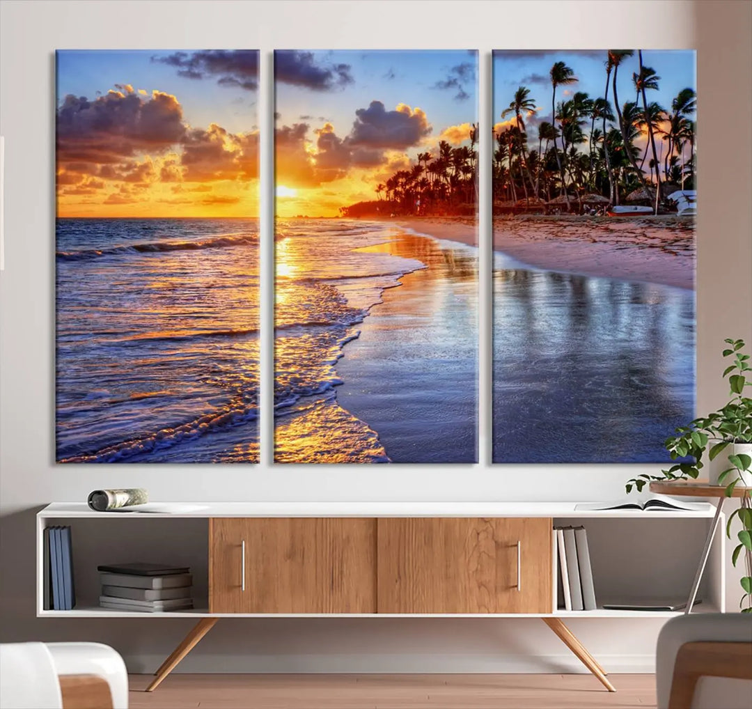 The dining area features a stunning Ocean Sunset Beach Canvas Print—a five-panel coastal wall art and tropical seascape triptych that beautifully captures the serene beauty of ocean waves set against a beach sunset scene.