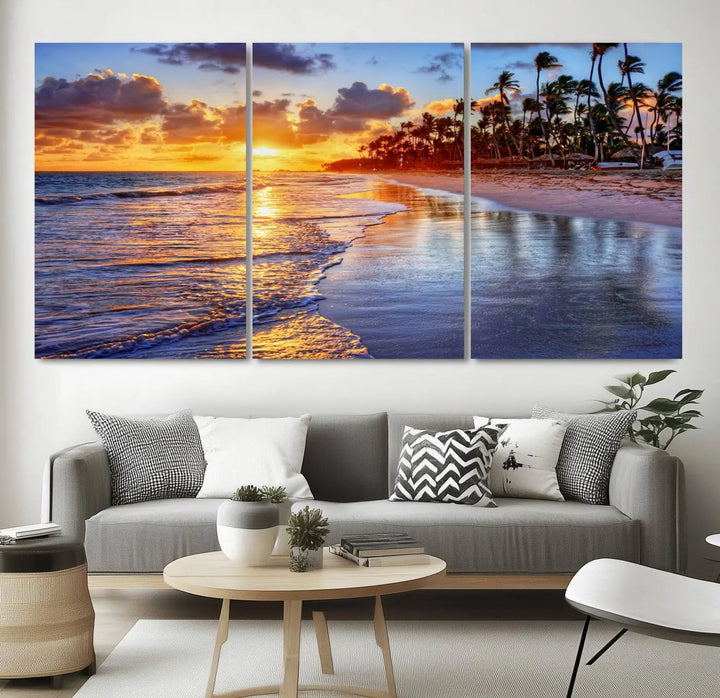 The dining area features a stunning Ocean Sunset Beach Canvas Print—a five-panel coastal wall art and tropical seascape triptych that beautifully captures the serene beauty of ocean waves set against a beach sunset scene.