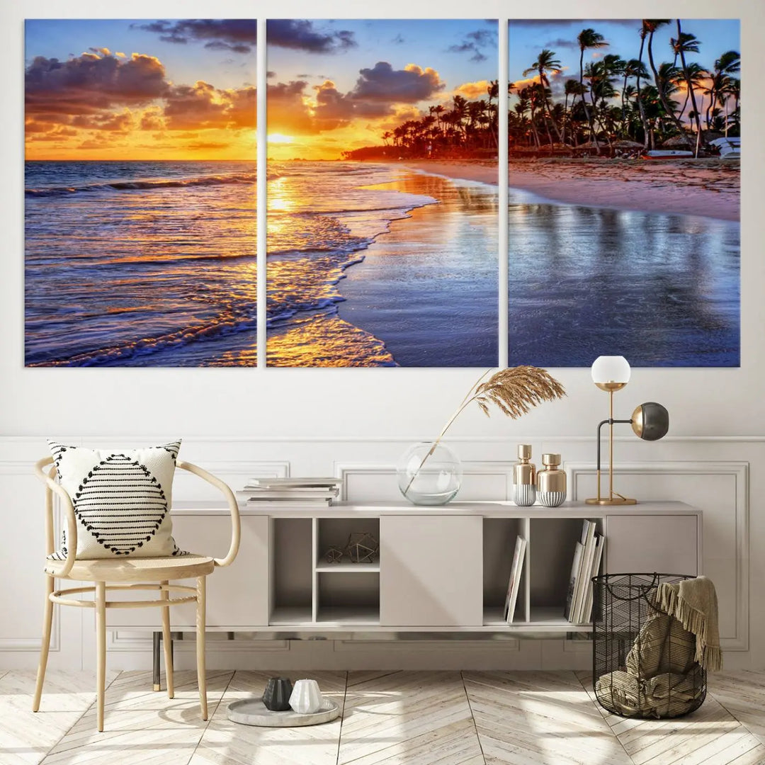 The dining area features a stunning Ocean Sunset Beach Canvas Print—a five-panel coastal wall art and tropical seascape triptych that beautifully captures the serene beauty of ocean waves set against a beach sunset scene.