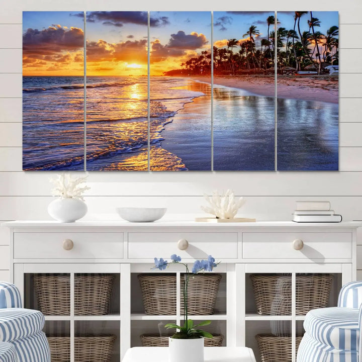 The dining area features a stunning Ocean Sunset Beach Canvas Print—a five-panel coastal wall art and tropical seascape triptych that beautifully captures the serene beauty of ocean waves set against a beach sunset scene.