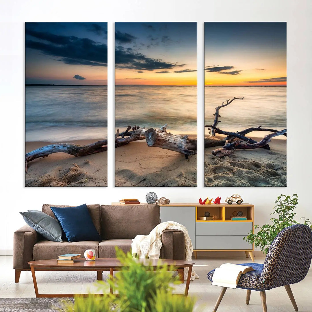 A captivating piece of Ocean Sunset Beach Wall Art Canvas Print, gallery wrapped, graces the gray wall.