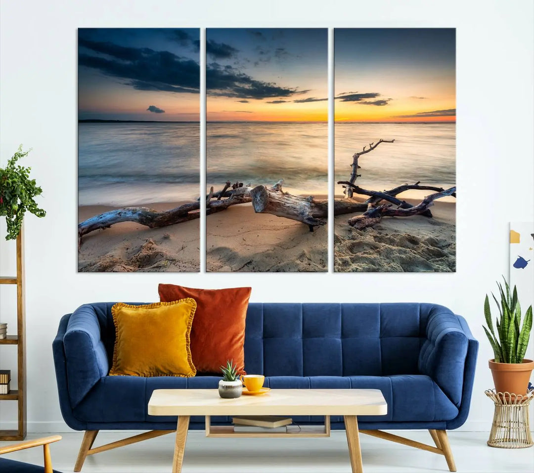 A captivating piece of Ocean Sunset Beach Wall Art Canvas Print, gallery wrapped, graces the gray wall.