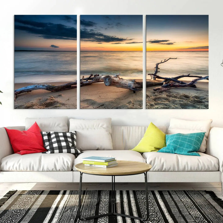 A captivating piece of Ocean Sunset Beach Wall Art Canvas Print, gallery wrapped, graces the gray wall.