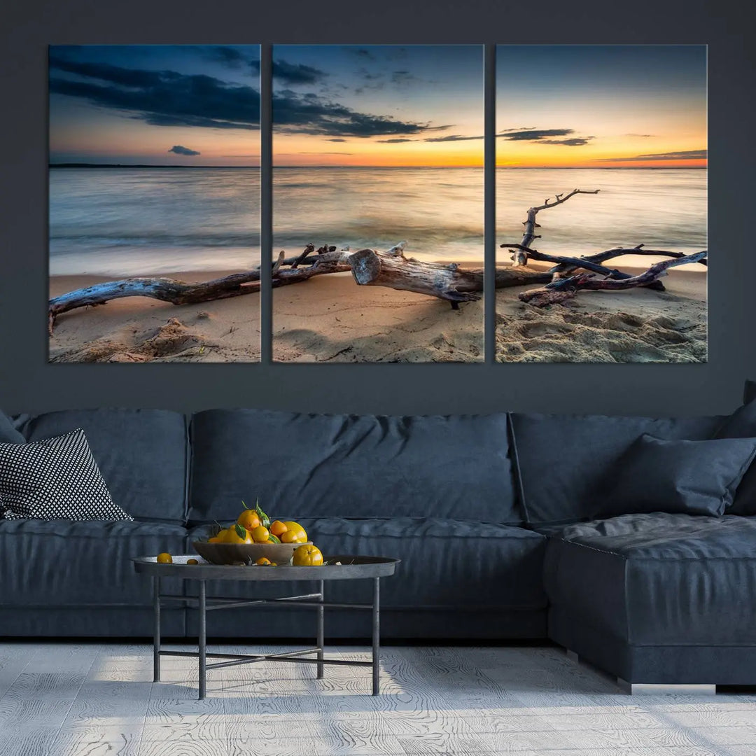 A captivating piece of Ocean Sunset Beach Wall Art Canvas Print, gallery wrapped, graces the gray wall.