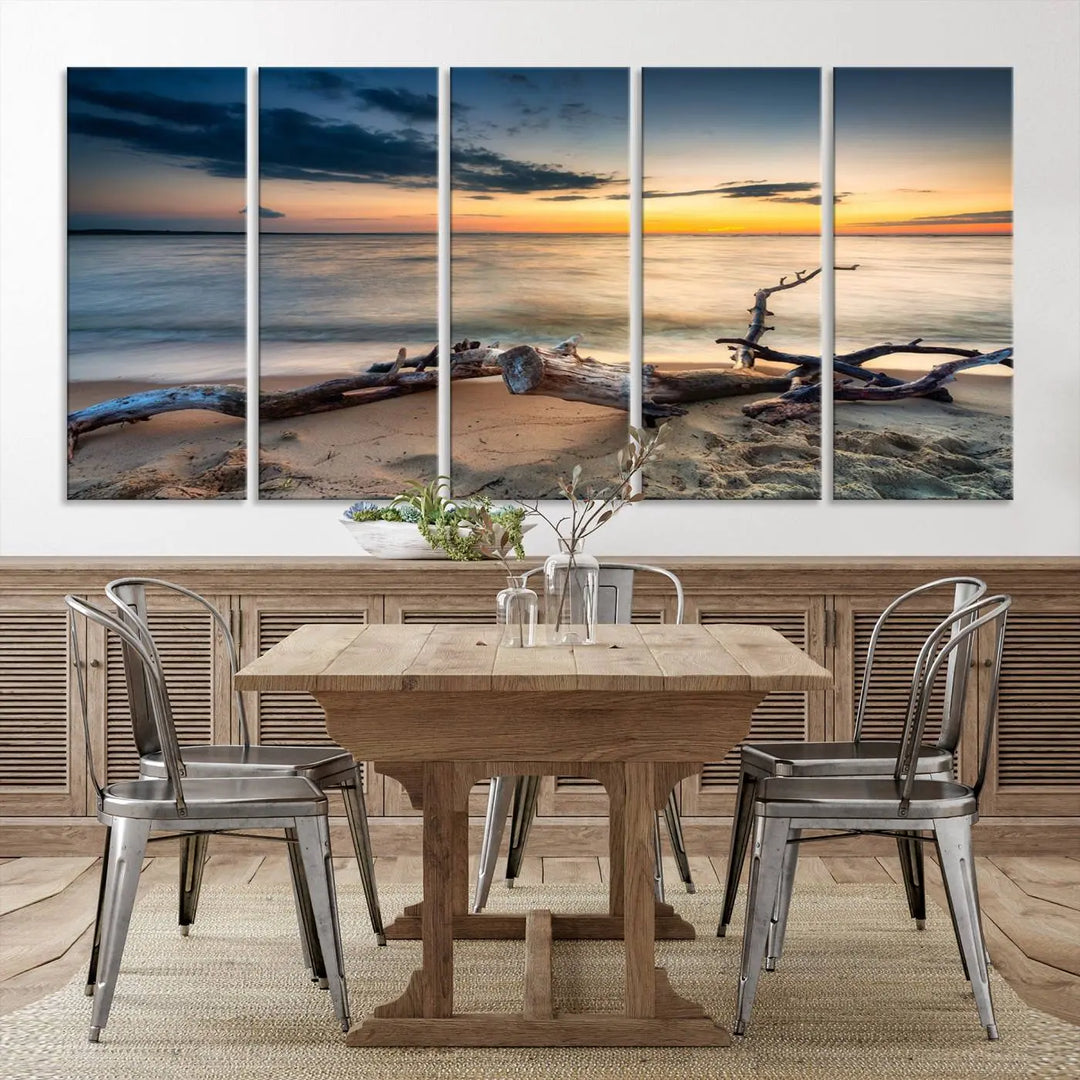 A captivating piece of Ocean Sunset Beach Wall Art Canvas Print, gallery wrapped, graces the gray wall.