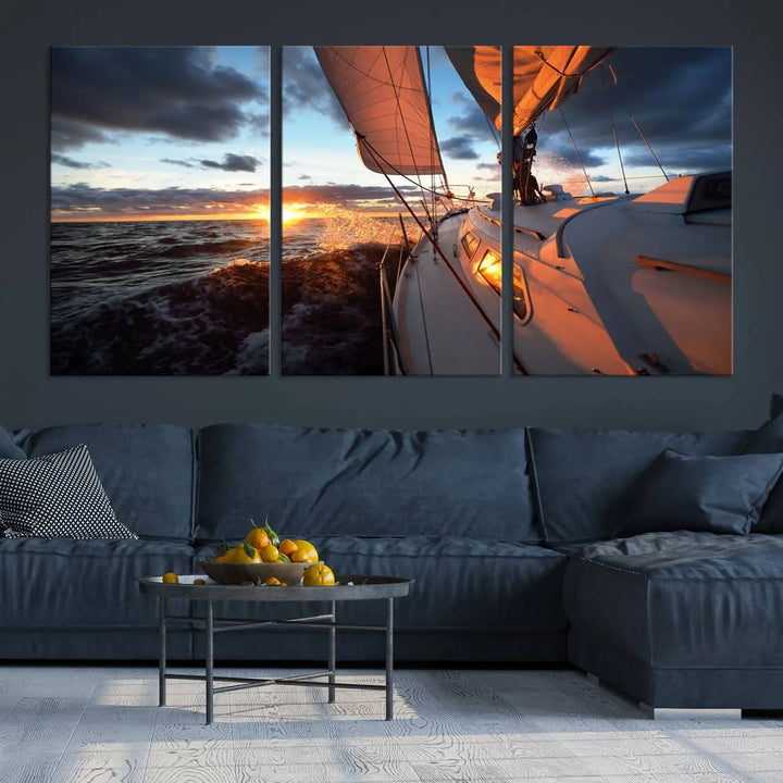 The modern living room is adorned with the Ocean Sunset Sailboat Wall Art, a triptych crafted on museum-quality canvas featuring UV-protective coating for lasting vibrancy.