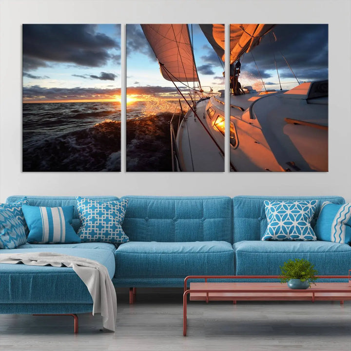 The modern living room is adorned with the Ocean Sunset Sailboat Wall Art, a triptych crafted on museum-quality canvas featuring UV-protective coating for lasting vibrancy.