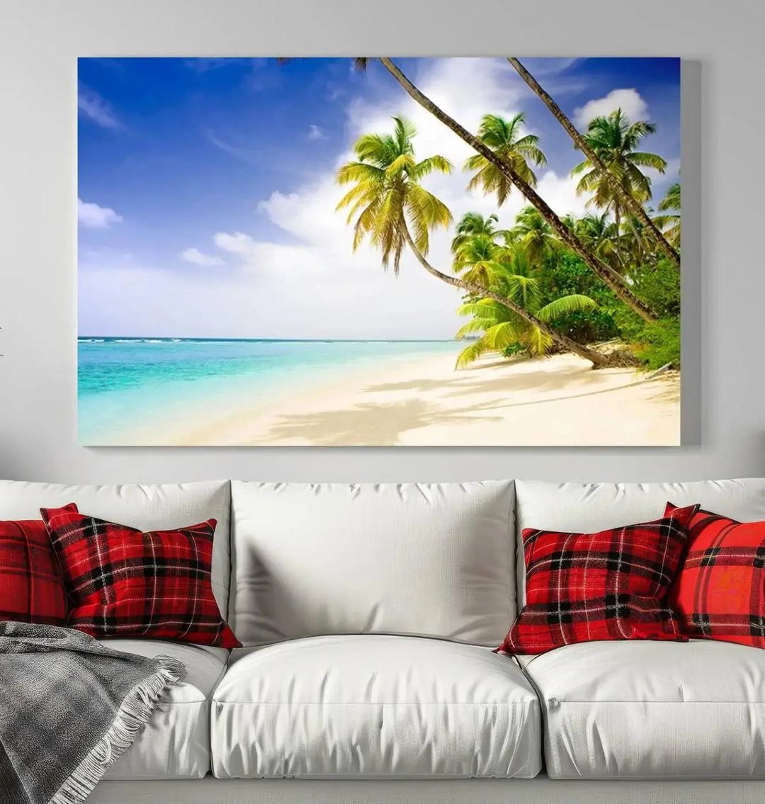 Above the beige sofa, the Ocean Tropical Beach Wall Art Print, featuring palm trees and crystal blue water, offers a calm ocean view, creating a tranquil oasis in the softly lit room.