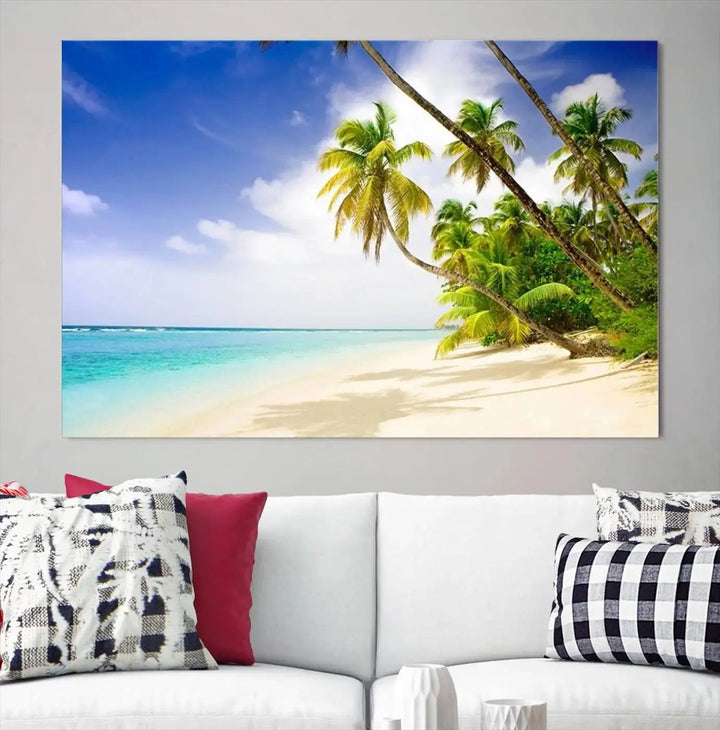 Above the beige sofa, the Ocean Tropical Beach Wall Art Print, featuring palm trees and crystal blue water, offers a calm ocean view, creating a tranquil oasis in the softly lit room.