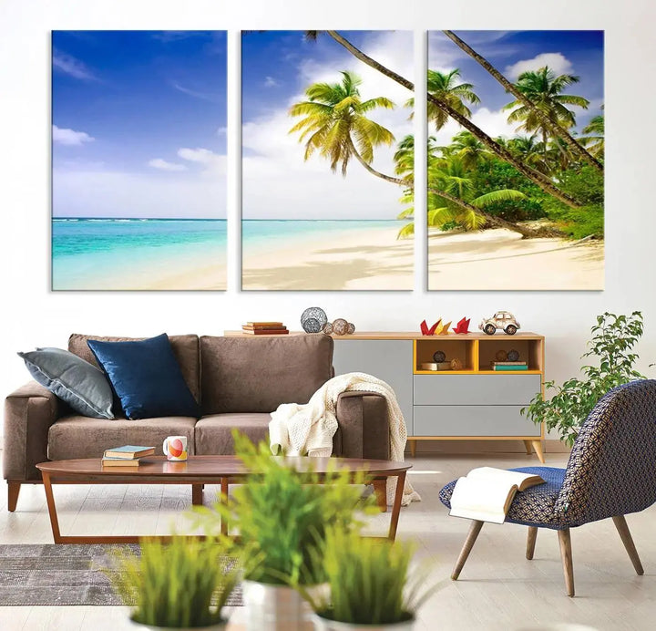 Above the beige sofa, the Ocean Tropical Beach Wall Art Print, featuring palm trees and crystal blue water, offers a calm ocean view, creating a tranquil oasis in the softly lit room.