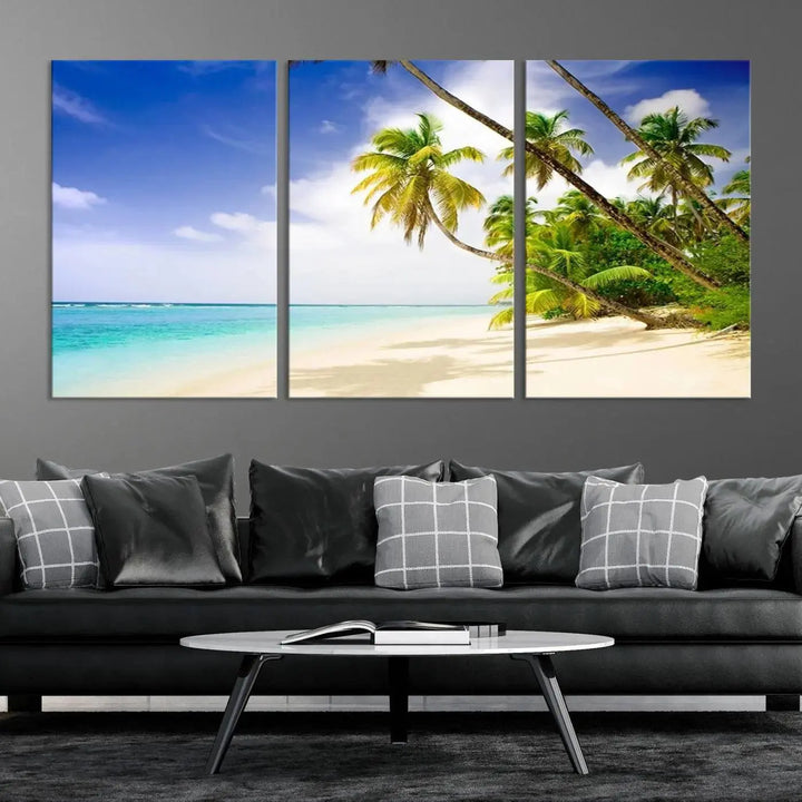 Above the beige sofa, the Ocean Tropical Beach Wall Art Print, featuring palm trees and crystal blue water, offers a calm ocean view, creating a tranquil oasis in the softly lit room.