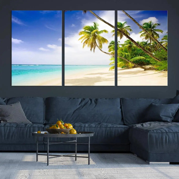 Above the beige sofa, the Ocean Tropical Beach Wall Art Print, featuring palm trees and crystal blue water, offers a calm ocean view, creating a tranquil oasis in the softly lit room.