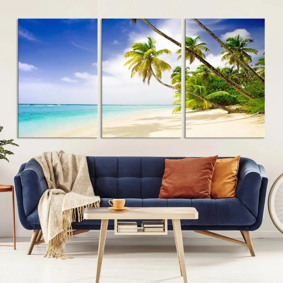 Above the beige sofa, the Ocean Tropical Beach Wall Art Print, featuring palm trees and crystal blue water, offers a calm ocean view, creating a tranquil oasis in the softly lit room.