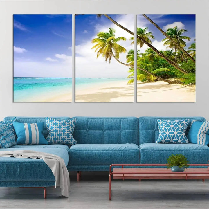 Above the beige sofa, the Ocean Tropical Beach Wall Art Print, featuring palm trees and crystal blue water, offers a calm ocean view, creating a tranquil oasis in the softly lit room.