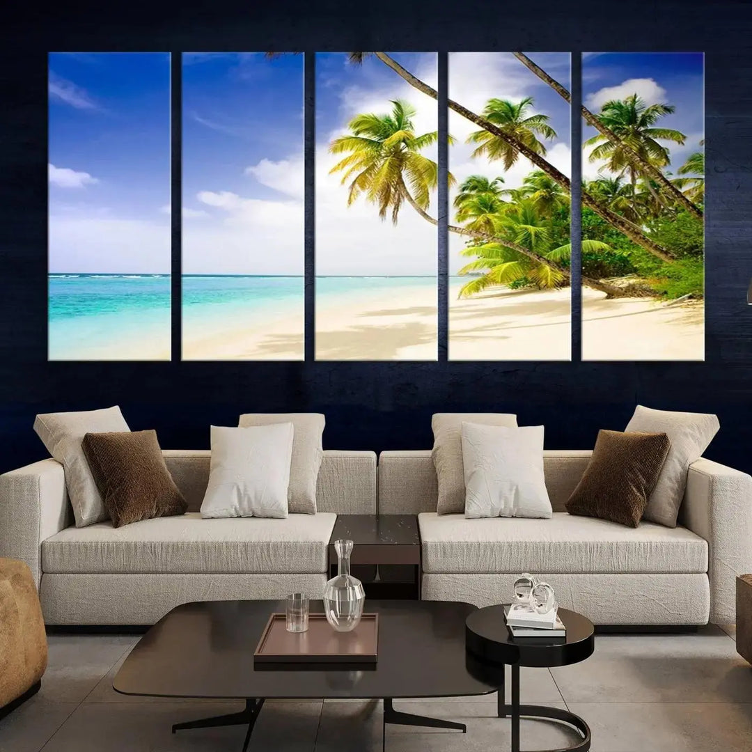 Above the beige sofa, the Ocean Tropical Beach Wall Art Print, featuring palm trees and crystal blue water, offers a calm ocean view, creating a tranquil oasis in the softly lit room.