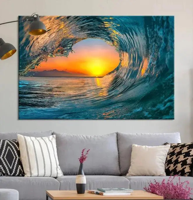 The Ocean Wave Sunset Wall Art, a large coastal wave canvas print comprising a 3-panel ocean sunset seascape, beautifully adorns the living room. This striking piece infuses the space with tranquility by capturing the serene beauty of an ocean wave against a sunset background.