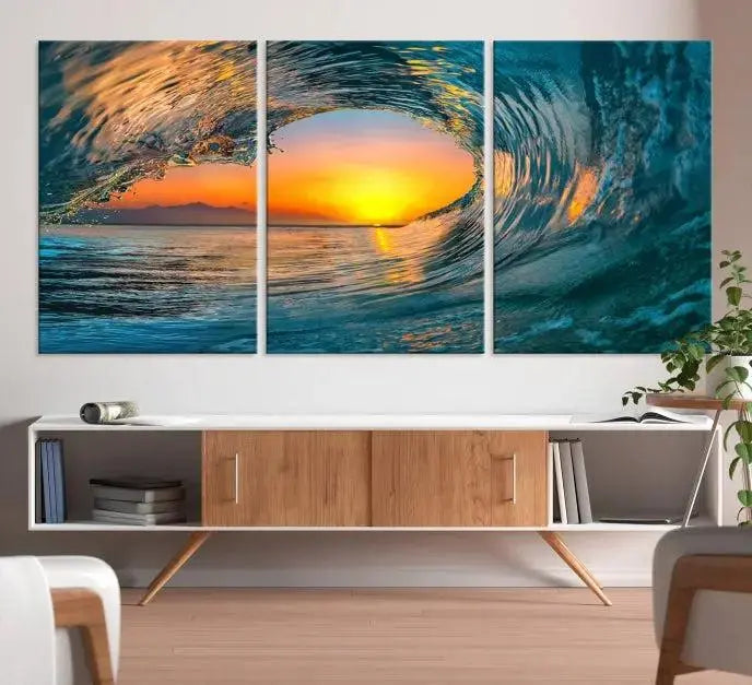 The Ocean Wave Sunset Wall Art, a large coastal wave canvas print comprising a 3-panel ocean sunset seascape, beautifully adorns the living room. This striking piece infuses the space with tranquility by capturing the serene beauty of an ocean wave against a sunset background.