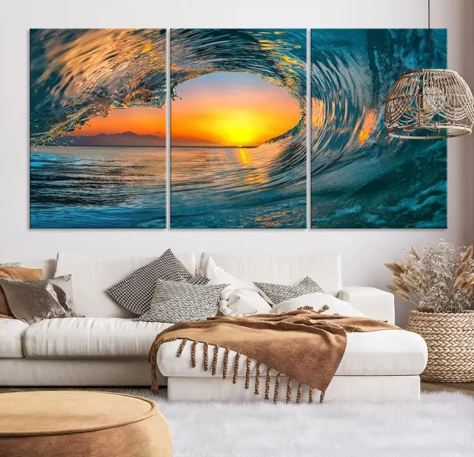 The Ocean Wave Sunset Wall Art, a large coastal wave canvas print comprising a 3-panel ocean sunset seascape, beautifully adorns the living room. This striking piece infuses the space with tranquility by capturing the serene beauty of an ocean wave against a sunset background.