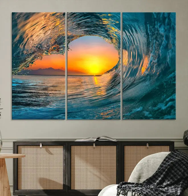 The Ocean Wave Sunset Wall Art, a large coastal wave canvas print comprising a 3-panel ocean sunset seascape, beautifully adorns the living room. This striking piece infuses the space with tranquility by capturing the serene beauty of an ocean wave against a sunset background.