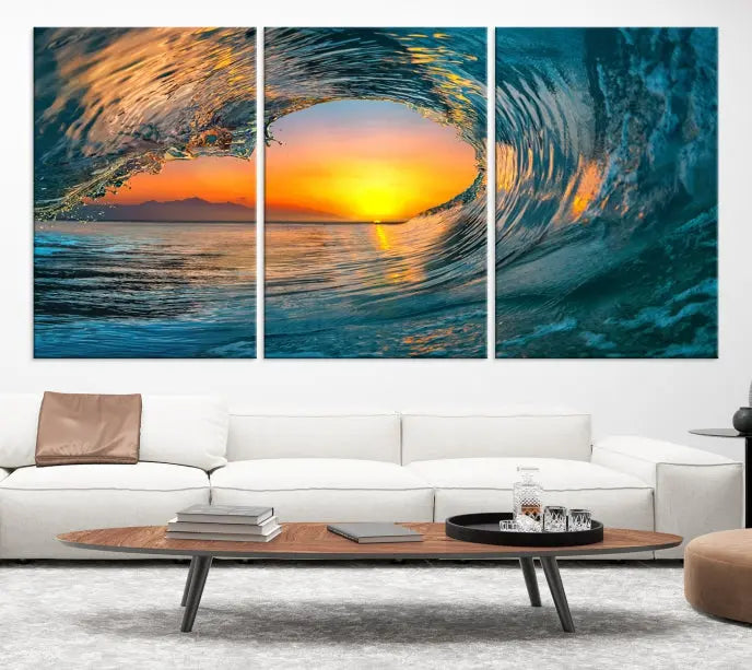 The Ocean Wave Sunset Wall Art, a large coastal wave canvas print comprising a 3-panel ocean sunset seascape, beautifully adorns the living room. This striking piece infuses the space with tranquility by capturing the serene beauty of an ocean wave against a sunset background.