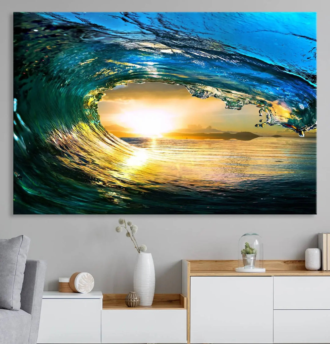 A modern dining room with a coastal vibe showcases a striking large wall print, the "Ocean Wave at Sunset Canvas Art," depicting vibrant water waves. The room features abstract wave artwork on the walls. This eye-catching piece of coastal art infuses the space with seaside serenity.