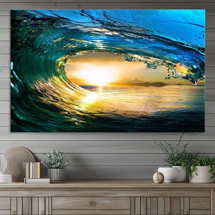 A modern dining room with a coastal vibe showcases a striking large wall print, the "Ocean Wave at Sunset Canvas Art," depicting vibrant water waves. The room features abstract wave artwork on the walls. This eye-catching piece of coastal art infuses the space with seaside serenity.