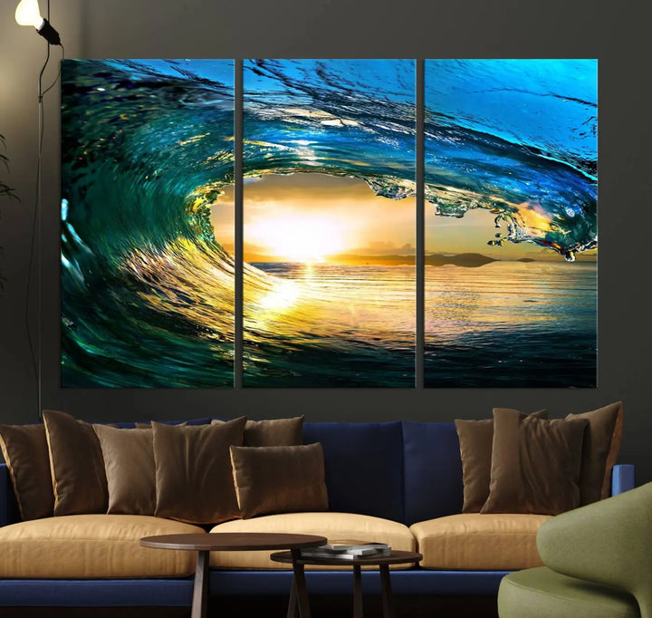 A modern dining room with a coastal vibe showcases a striking large wall print, the "Ocean Wave at Sunset Canvas Art," depicting vibrant water waves. The room features abstract wave artwork on the walls. This eye-catching piece of coastal art infuses the space with seaside serenity.