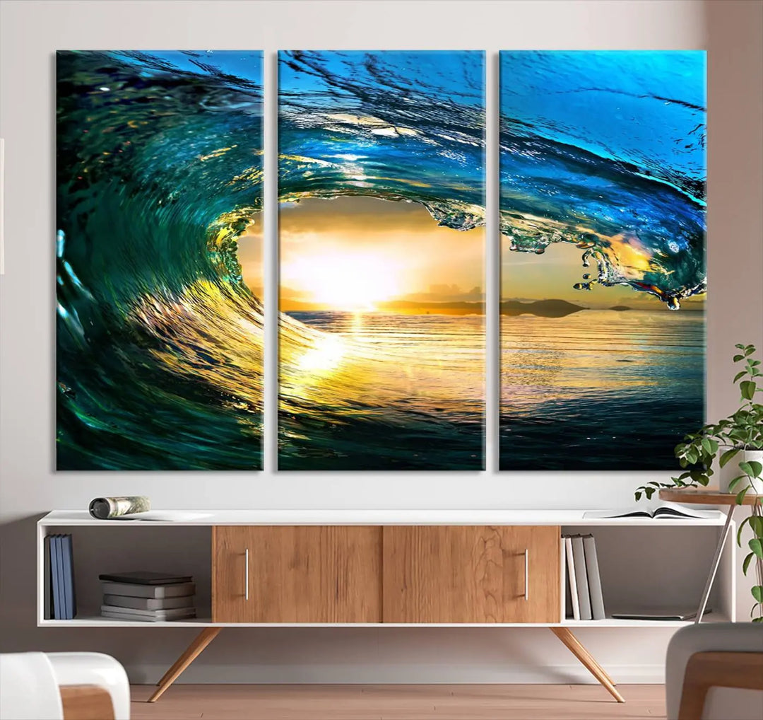 A modern dining room with a coastal vibe showcases a striking large wall print, the "Ocean Wave at Sunset Canvas Art," depicting vibrant water waves. The room features abstract wave artwork on the walls. This eye-catching piece of coastal art infuses the space with seaside serenity.