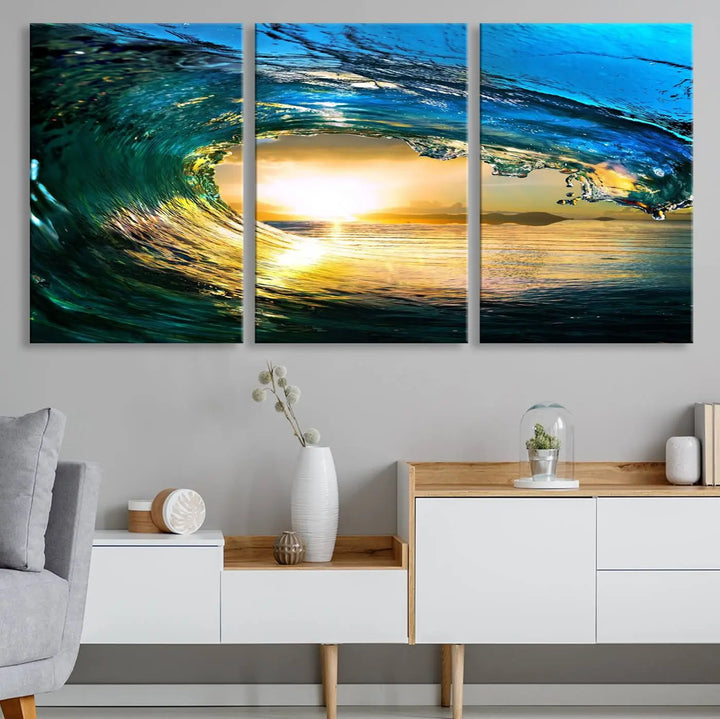 A modern dining room with a coastal vibe showcases a striking large wall print, the "Ocean Wave at Sunset Canvas Art," depicting vibrant water waves. The room features abstract wave artwork on the walls. This eye-catching piece of coastal art infuses the space with seaside serenity.