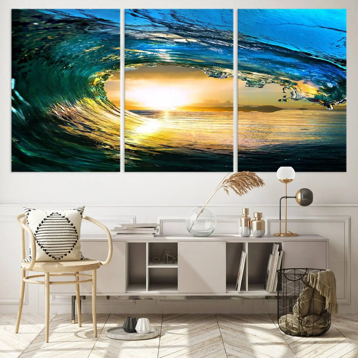 A modern dining room with a coastal vibe showcases a striking large wall print, the "Ocean Wave at Sunset Canvas Art," depicting vibrant water waves. The room features abstract wave artwork on the walls. This eye-catching piece of coastal art infuses the space with seaside serenity.