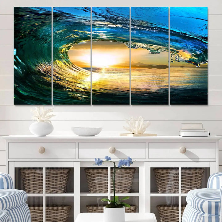 A modern dining room with a coastal vibe showcases a striking large wall print, the "Ocean Wave at Sunset Canvas Art," depicting vibrant water waves. The room features abstract wave artwork on the walls. This eye-catching piece of coastal art infuses the space with seaside serenity.