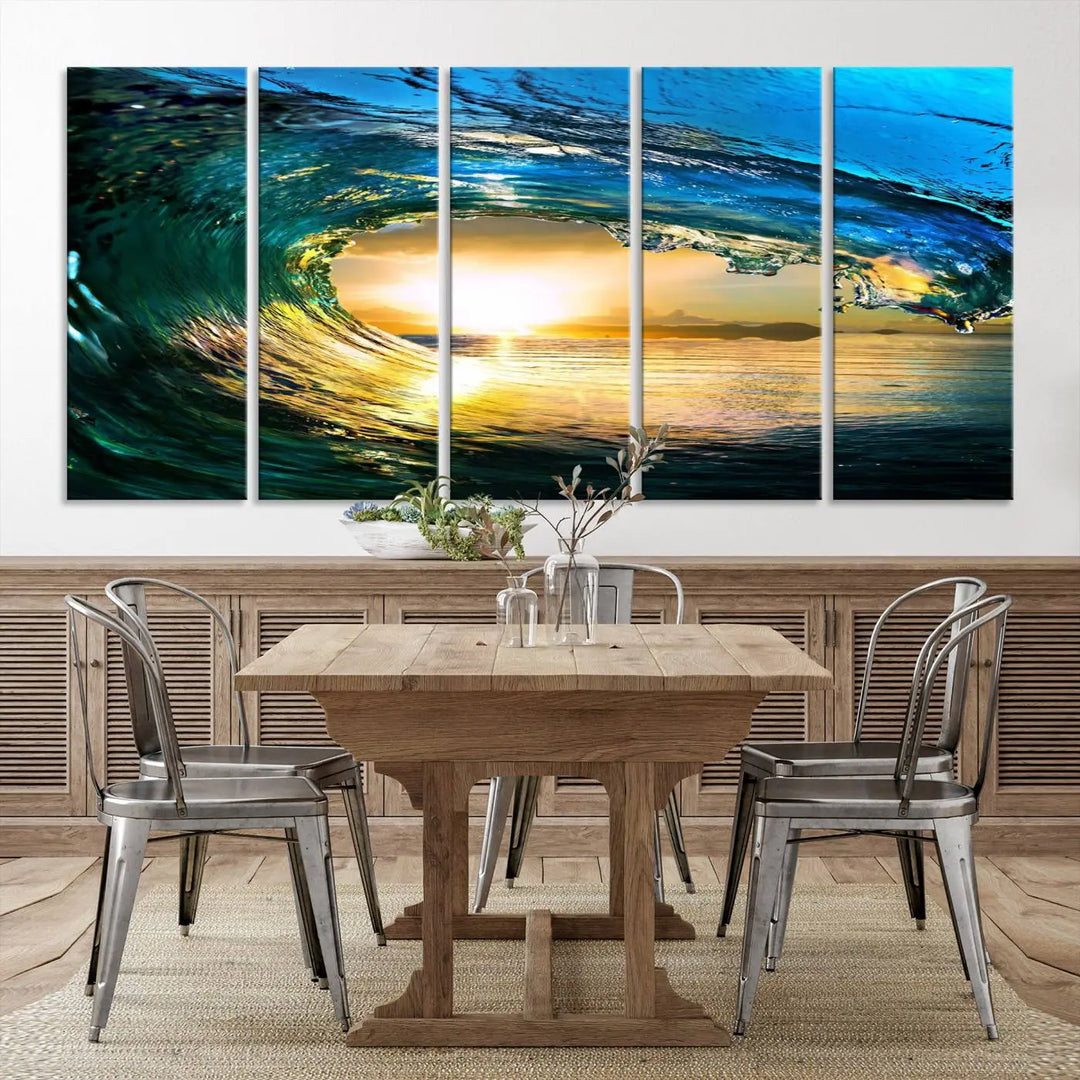 A modern dining room with a coastal vibe showcases a striking large wall print, the "Ocean Wave at Sunset Canvas Art," depicting vibrant water waves. The room features abstract wave artwork on the walls. This eye-catching piece of coastal art infuses the space with seaside serenity.