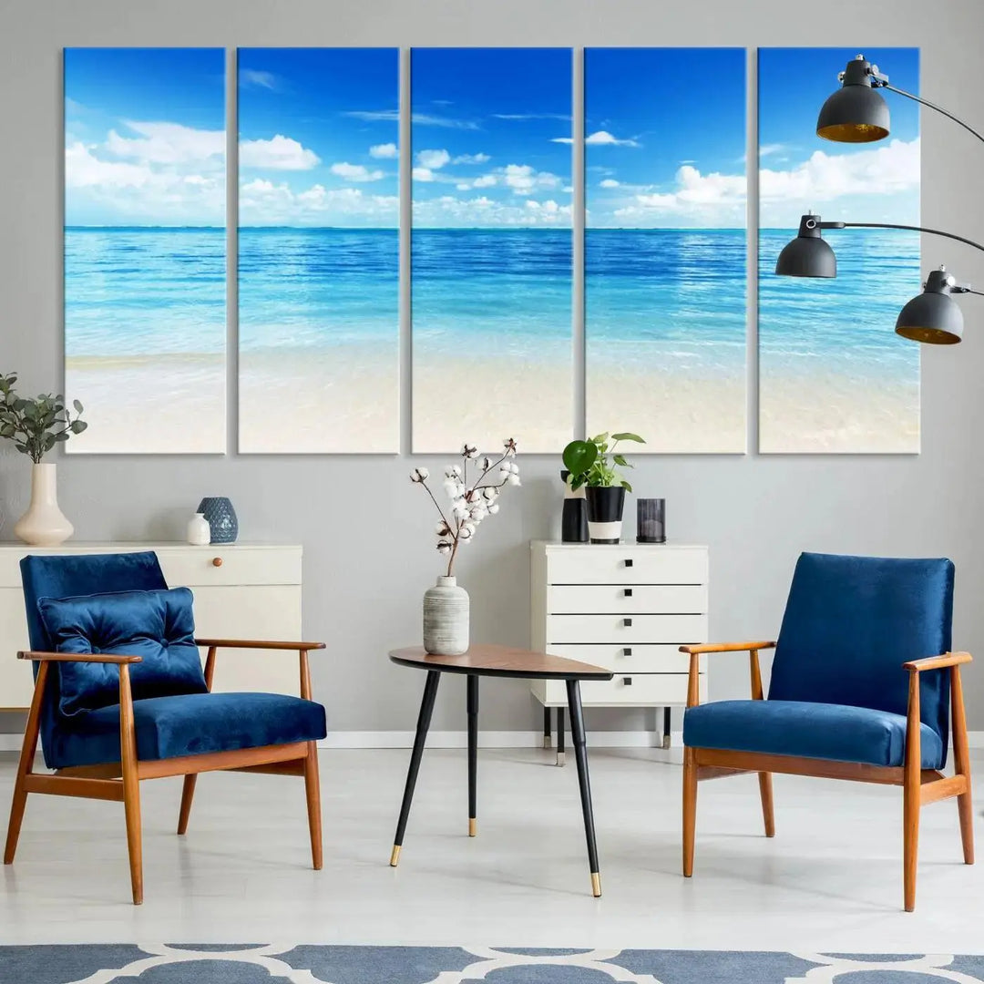 An Ocean and Beach Artwork Canvas Print Wall Art, divided into a triptych and crafted on museum-quality canvases ready to hang, decorates the wall.