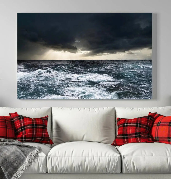 An Ocean and Storm Canvas Art Print, featuring a triptych of turbulent seas and skies on museum-quality canvas with UV-protective coating, is displayed above the living room. It enhances the space by bringing an effortlessly stylish touch.