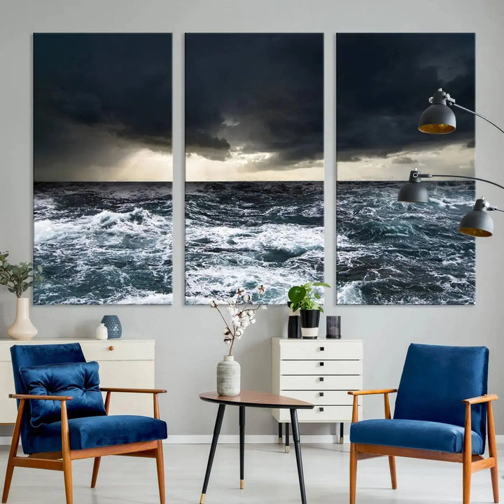 An Ocean and Storm Canvas Art Print, featuring a triptych of turbulent seas and skies on museum-quality canvas with UV-protective coating, is displayed above the living room. It enhances the space by bringing an effortlessly stylish touch.