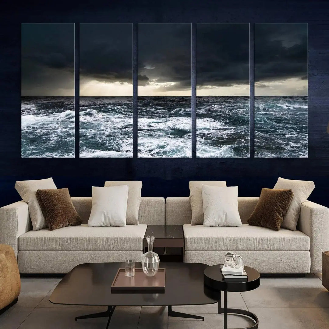 An Ocean and Storm Canvas Art Print, featuring a triptych of turbulent seas and skies on museum-quality canvas with UV-protective coating, is displayed above the living room. It enhances the space by bringing an effortlessly stylish touch.