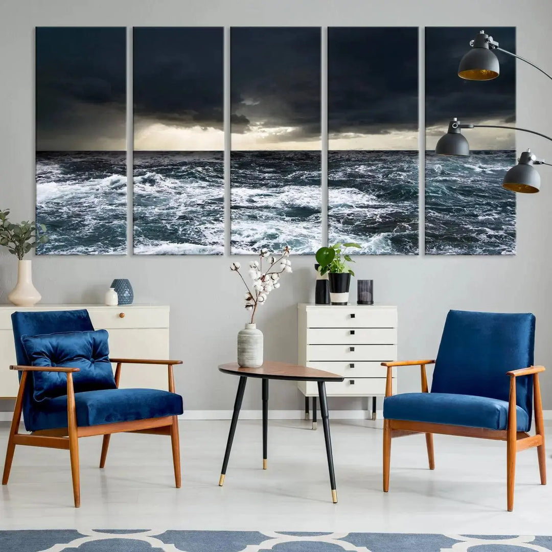 An Ocean and Storm Canvas Art Print, featuring a triptych of turbulent seas and skies on museum-quality canvas with UV-protective coating, is displayed above the living room. It enhances the space by bringing an effortlessly stylish touch.