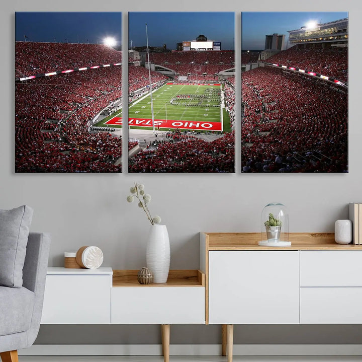 The Ohio State University Buckeyes Football Team Print, showcasing a vibrant view of the Columbus Ohio Stadium, is displayed in a modern room. Its gallery-quality finish enhances the space.