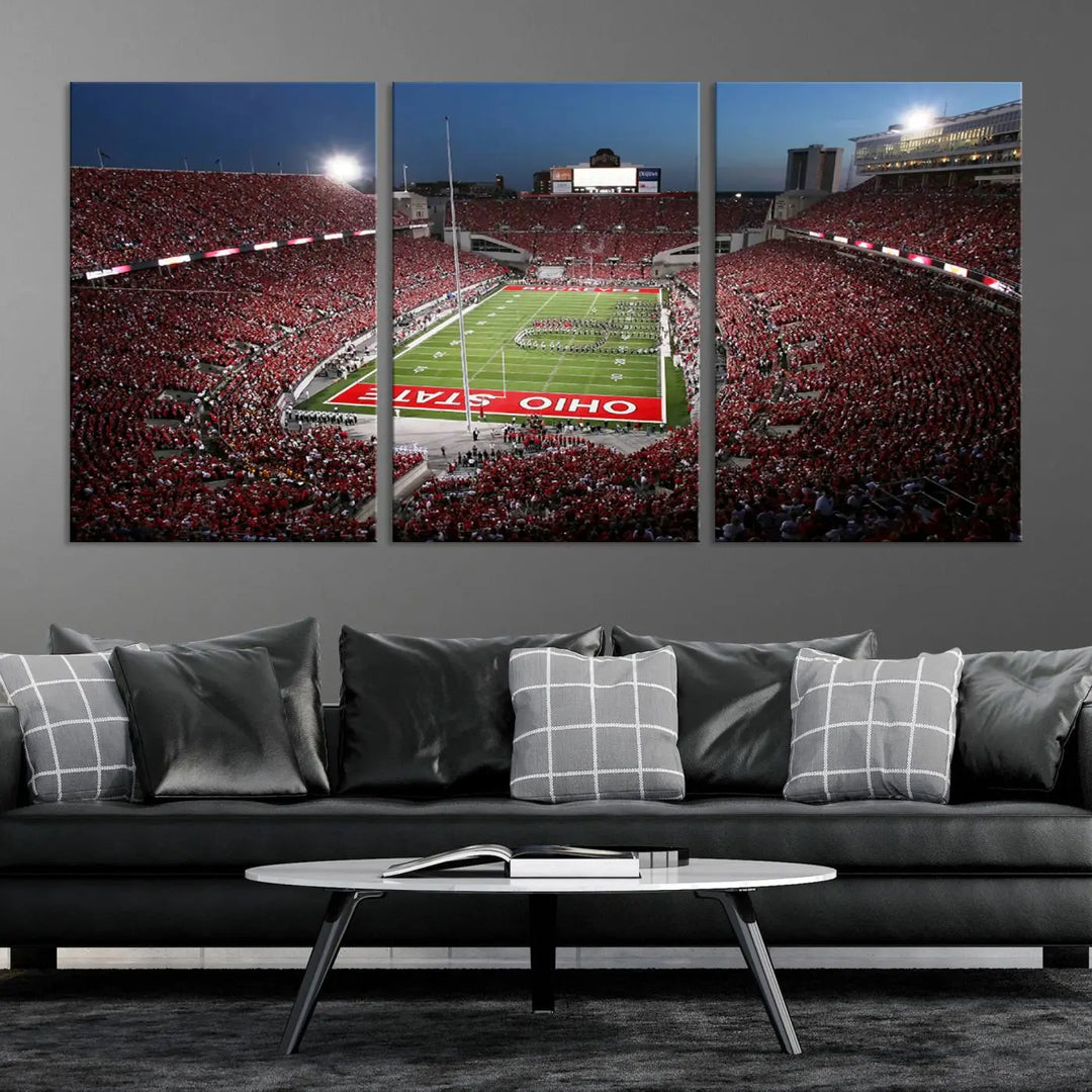 The Ohio State University Buckeyes Football Team Print, showcasing a vibrant view of the Columbus Ohio Stadium, is displayed in a modern room. Its gallery-quality finish enhances the space.