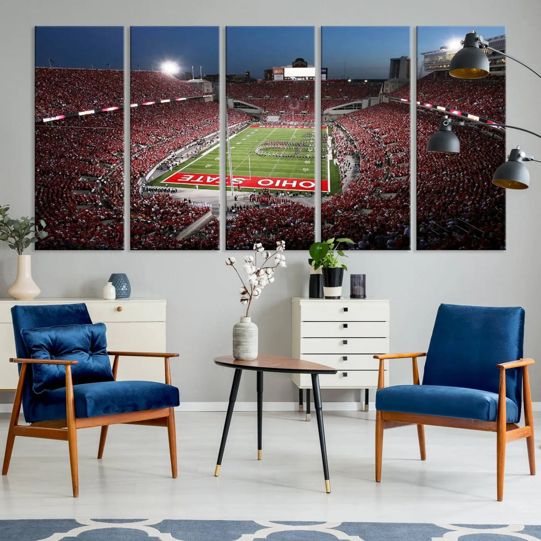 The Ohio State University Buckeyes Football Team Print, showcasing a vibrant view of the Columbus Ohio Stadium, is displayed in a modern room. Its gallery-quality finish enhances the space.