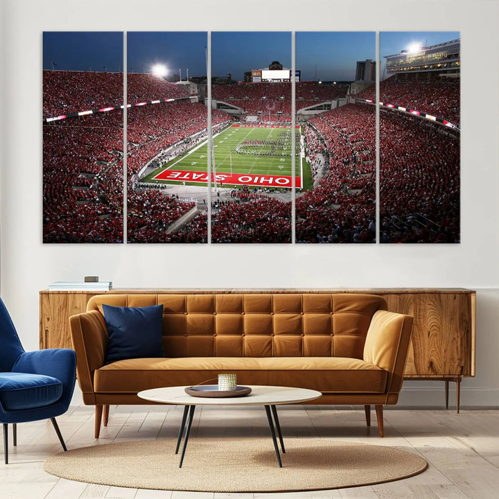 The Ohio State University Buckeyes Football Team Print, showcasing a vibrant view of the Columbus Ohio Stadium, is displayed in a modern room. Its gallery-quality finish enhances the space.