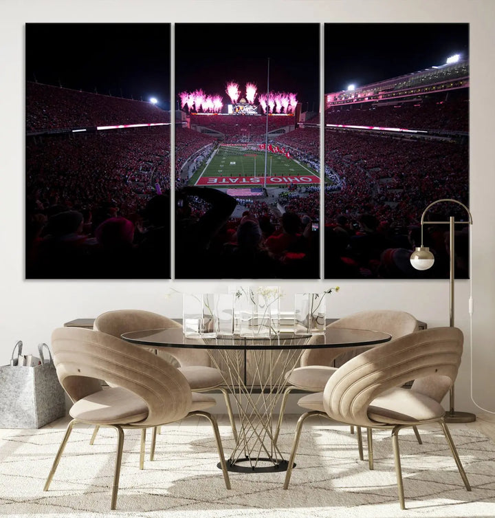 The living room features a breathtaking Ohio State University Buckeyes Football Team Print, depicting a stadium packed with fans, fireworks illuminating the sky, and Ohio State on the field. This Columbus Ohio Stadium Wall Art Canvas Print offers a vibrant display with a gallery-quality finish that instantly draws attention.