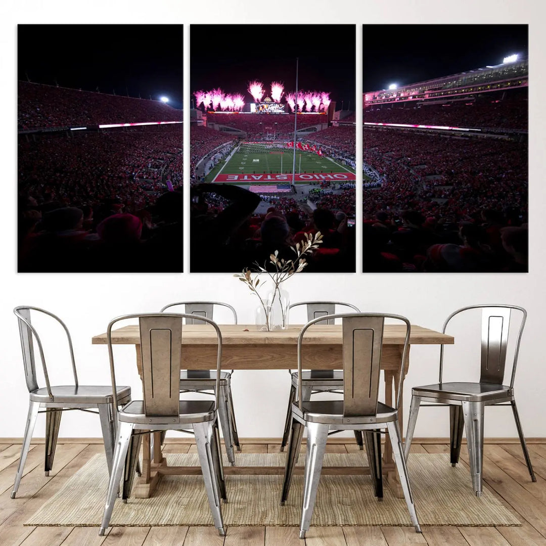 The living room features a breathtaking Ohio State University Buckeyes Football Team Print, depicting a stadium packed with fans, fireworks illuminating the sky, and Ohio State on the field. This Columbus Ohio Stadium Wall Art Canvas Print offers a vibrant display with a gallery-quality finish that instantly draws attention.