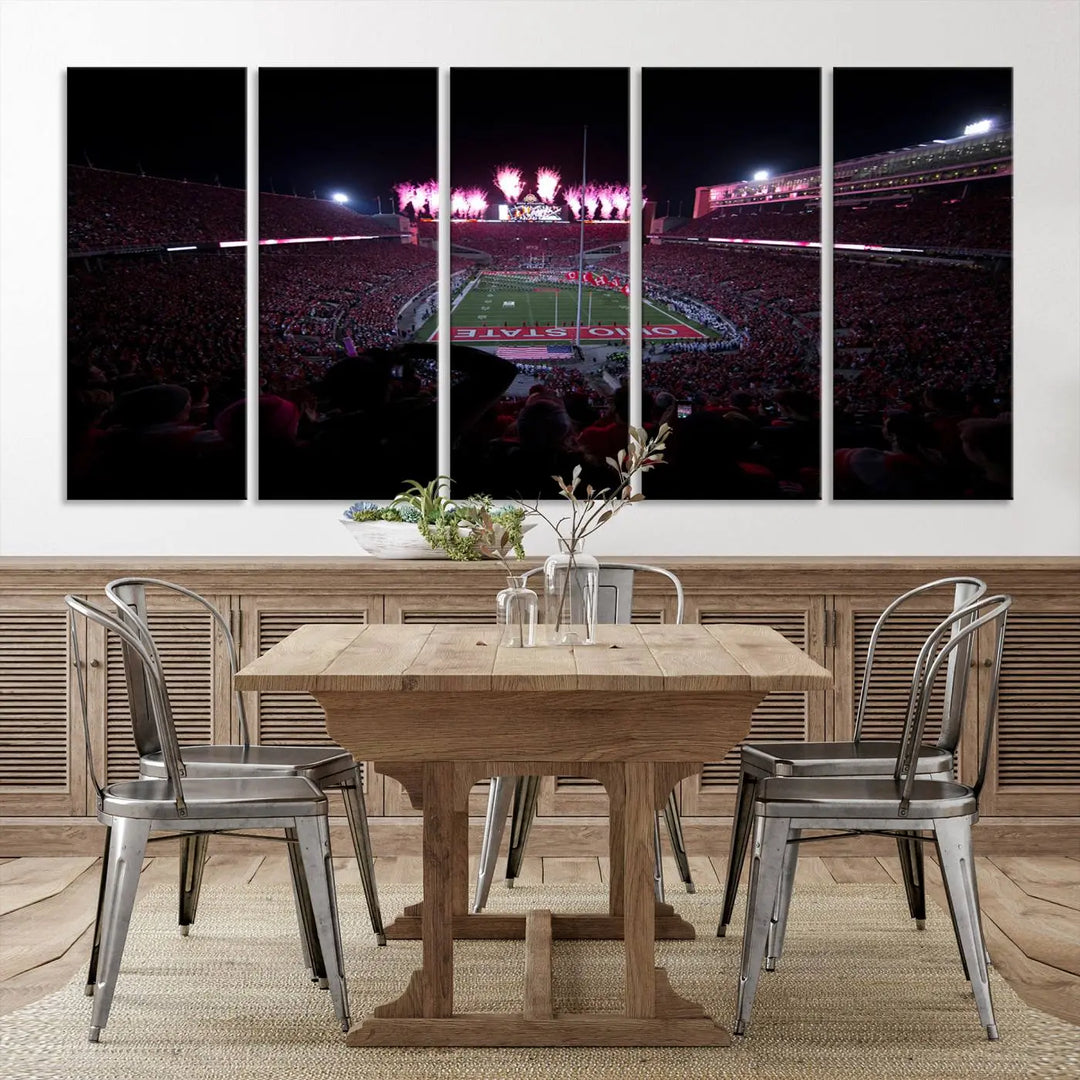 The living room features a breathtaking Ohio State University Buckeyes Football Team Print, depicting a stadium packed with fans, fireworks illuminating the sky, and Ohio State on the field. This Columbus Ohio Stadium Wall Art Canvas Print offers a vibrant display with a gallery-quality finish that instantly draws attention.