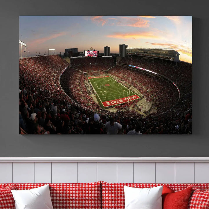 An Ohio State University Buckeyes Football Team print featuring the Columbus Ohio Stadium, beautifully crafted on premium canvas for a gallery-quality finish, adorns the wall.