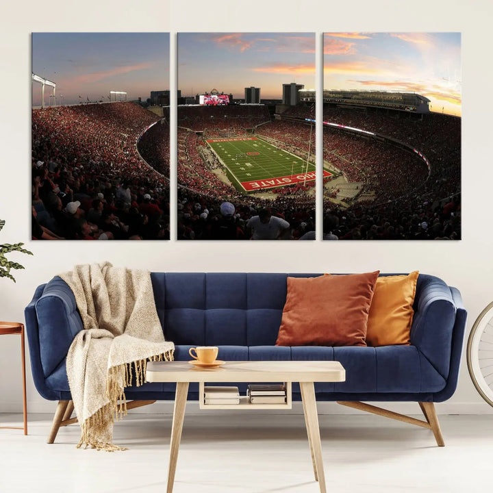 An Ohio State University Buckeyes Football Team print featuring the Columbus Ohio Stadium, beautifully crafted on premium canvas for a gallery-quality finish, adorns the wall.