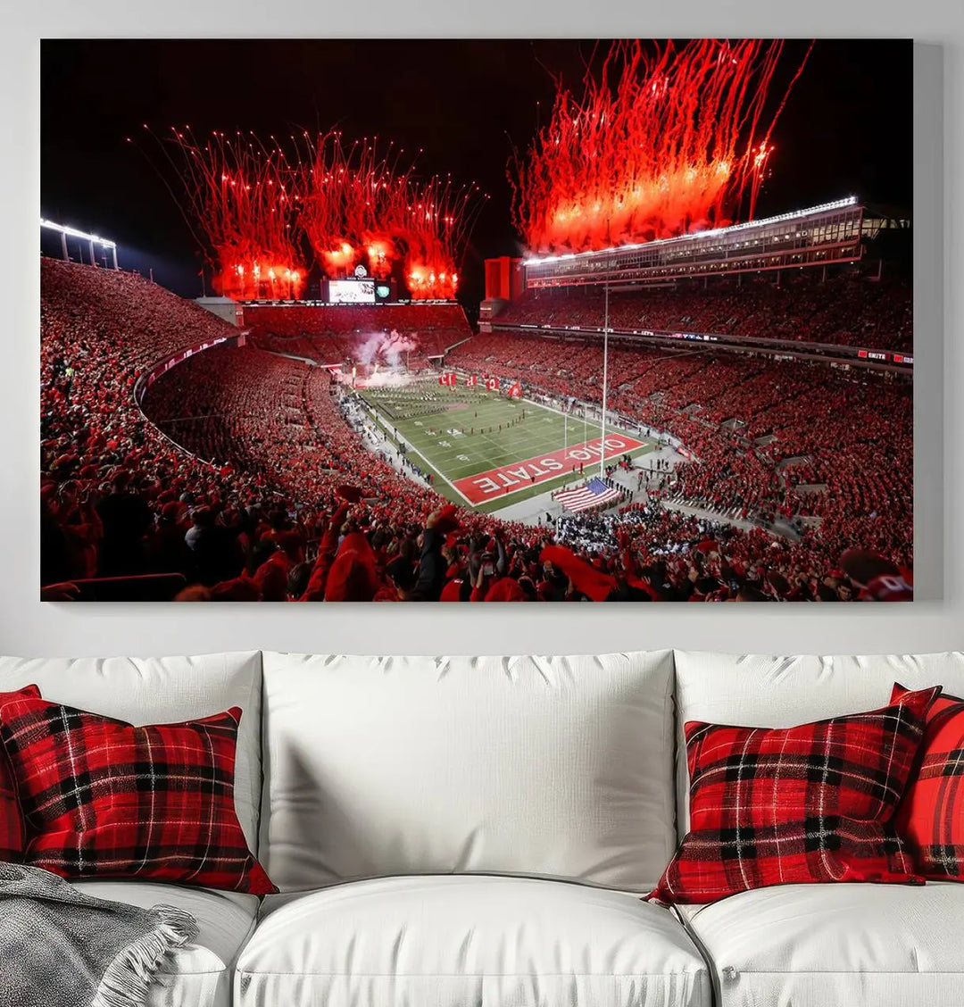 The Ohio State University Buckeyes Football Team Print showcases a vibrant Columbus Ohio Stadium, teeming with fans and illuminated by red fireworks against the night sky. Printed on premium canvas with a gallery-quality finish, this exquisite piece of wall art makes an elegant statement and enhances any space with sophistication.