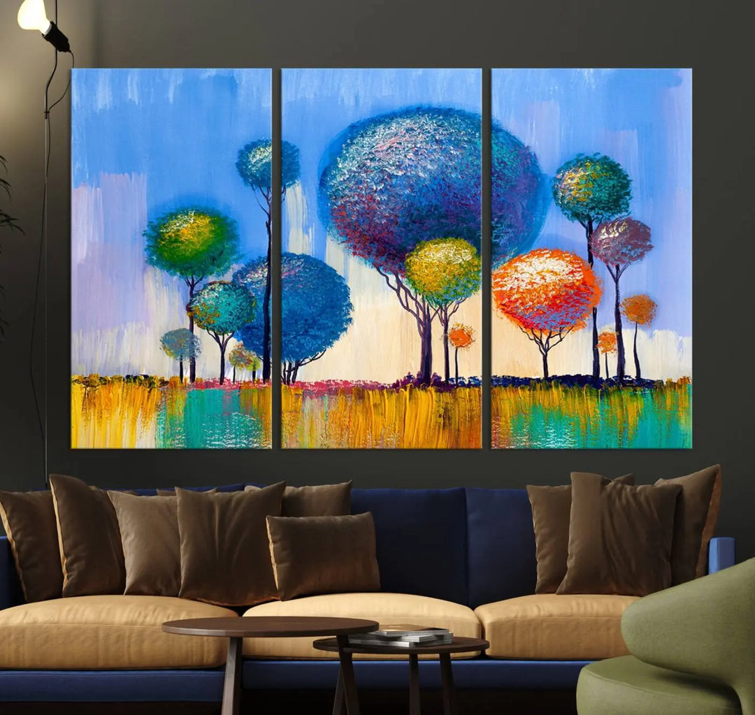 The vibrant "Oil Paint Effect Colorful Trees Wall Art Canvas Print," with its abstract depiction of round-topped trees on a blue background, is printed on museum-quality canvas and includes a UV-protective coating to maintain its bright colors.