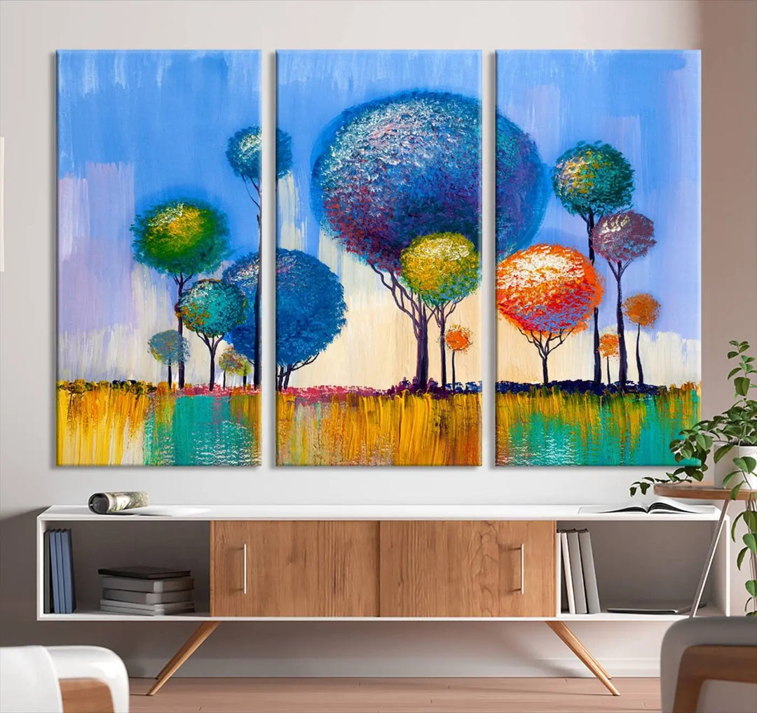 The vibrant "Oil Paint Effect Colorful Trees Wall Art Canvas Print," with its abstract depiction of round-topped trees on a blue background, is printed on museum-quality canvas and includes a UV-protective coating to maintain its bright colors.