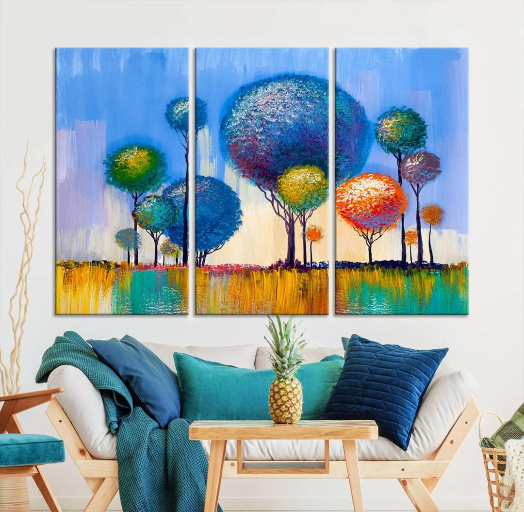 The vibrant "Oil Paint Effect Colorful Trees Wall Art Canvas Print," with its abstract depiction of round-topped trees on a blue background, is printed on museum-quality canvas and includes a UV-protective coating to maintain its bright colors.